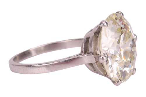 Lot 246 - A transitional-cut diamond solitaire ring, the...