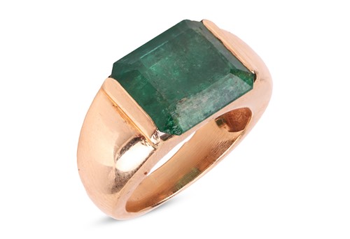 Lot 199 - An emerald dress ring, featuring a deep green...
