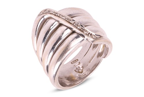 Lot 156 - A diamond-set coil ring, by Maria Grazia...
