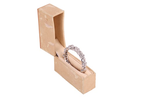 Lot 302 - David Morris - a diamond-set flexible torque...