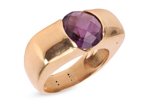 Lot 163 - An amethyst dress ring, comprises a round rose...