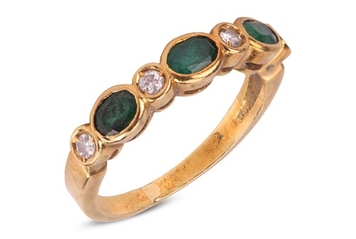 Lot 159 - An emerald and diamond half-hoop ring,...