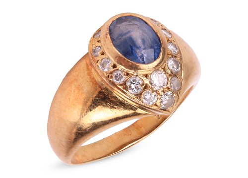 Lot 82 - A sapphire and diamond dress ring, the...