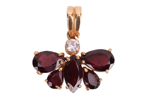 Lot 260 - A garnet butterfly pendant, with a round...