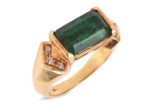 Lot 98 - An emerald and diamond ring, comprises a deep...