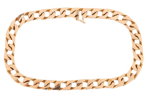 Lot 19 - A flat curb link bracelet, completed with an...