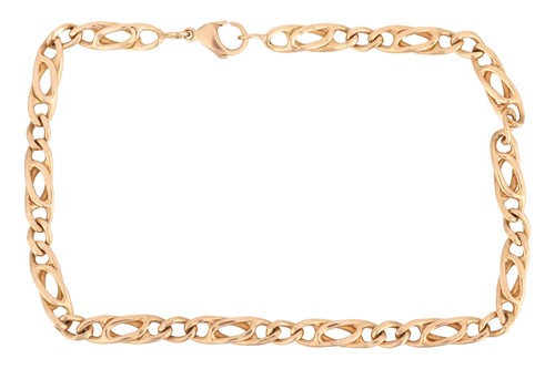 Lot 50 - A fancy curb link bracelet in 18ct yellow gold,...