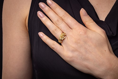Lot 237 - Boodles - a diamond-set 'Blossom Triple' ring...