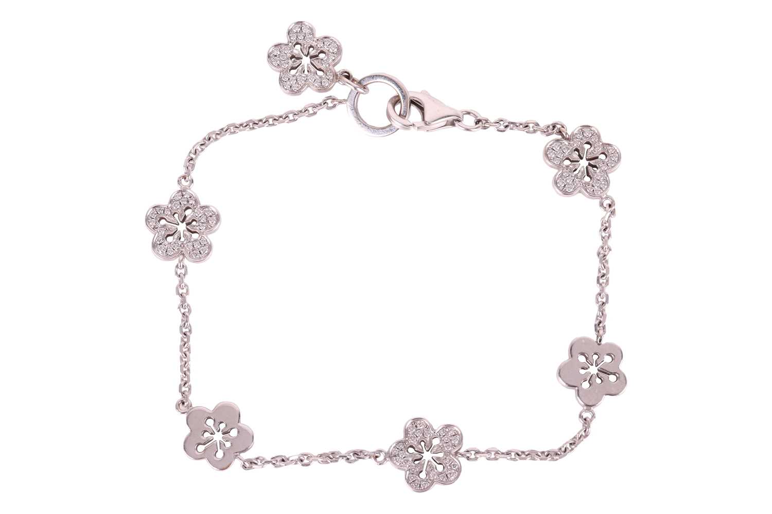 Lot 239 - Boodles - a diamond-set 'Blossom' charm...
