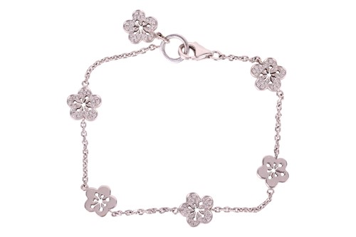 Lot 239 - Boodles - a diamond-set 'Blossom' charm...