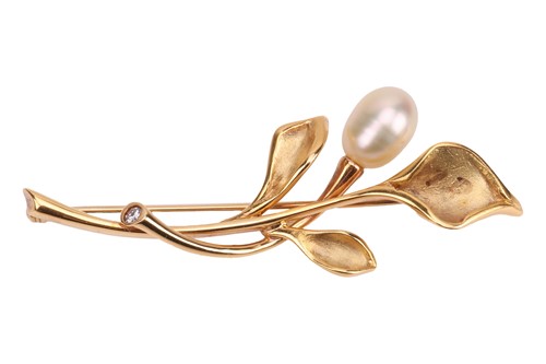 Lot 57 - A pearl-set spray brooch, the stylised...