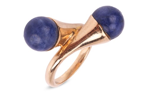 Lot 64 - Gucci- a lapis lazuli cross-over ring in 9ct...
