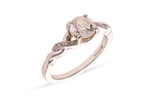 Lot 272 - A diamond solitaire ring, centred with a...