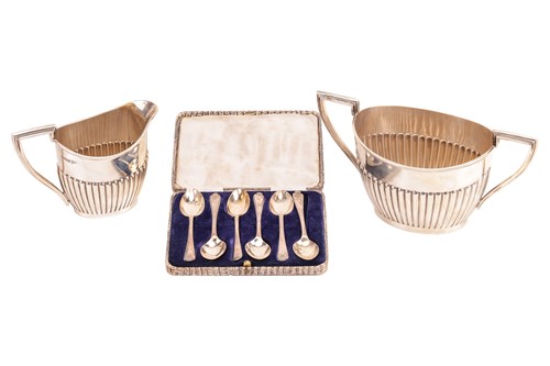Lot 361 - A heavy-gauge silver two-handle sugar and...