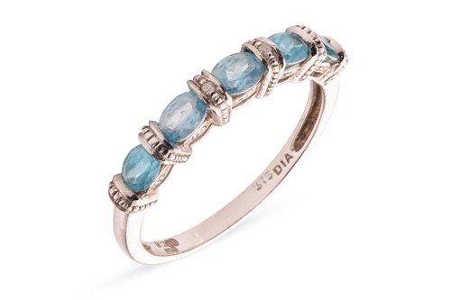 Lot 246 - A topaz half-hoop ring in 9ct white gold,...