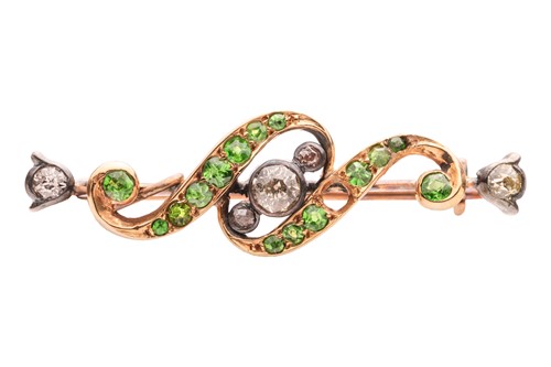 Lot 6 - An Edwardian demantoid garnet and diamond bar...