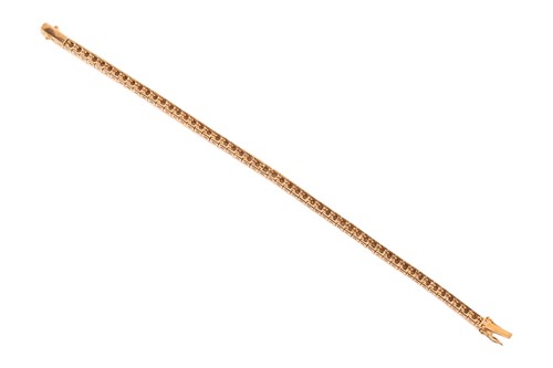Lot 252 - A diamond line bracelet, with an estimated...