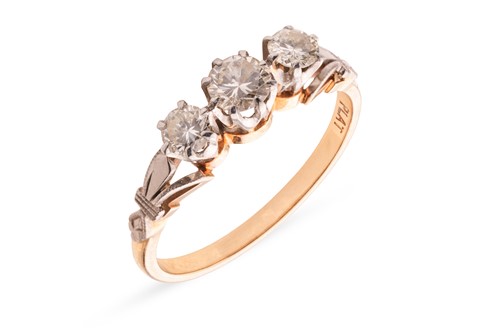 Lot 150 - A diamond trilogy ring, claw-set with three...
