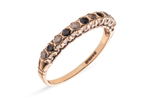 Lot 185 - A sapphire and paste-set half-hoop ring,...