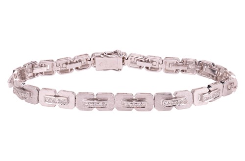 Lot 248 - A diamond-set link bracelet, comprising a...