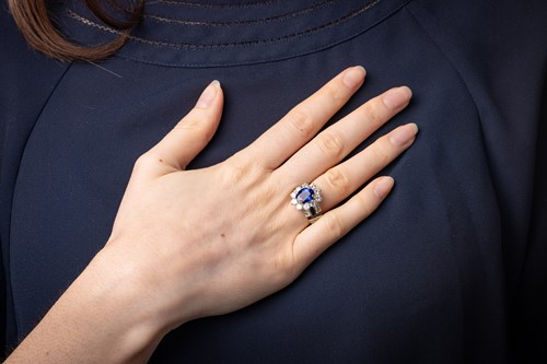 Lot 181 - An unheated Burmese sapphire and diamond dress...
