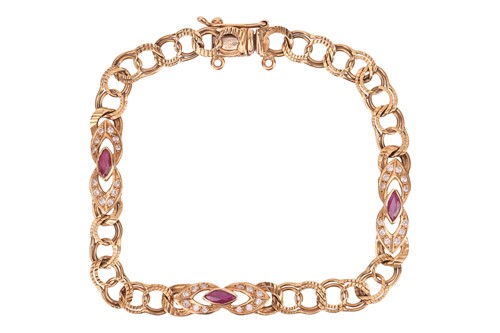 Lot 240 - A gem-set figure-of-eight link bracelet,...