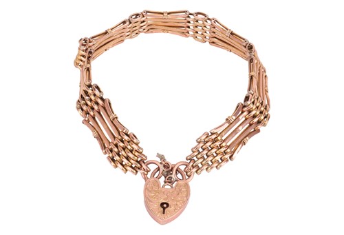 Lot 35 - A panther link bracelet with padlock clasp,...