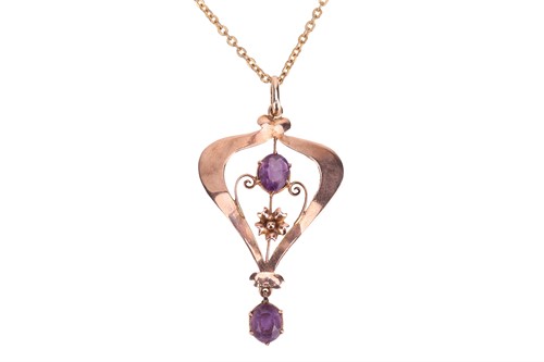 Lot 17 - An Edwardian amethyst-set pendant, claw-set...