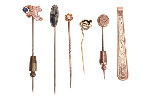 Lot 29 - A group of gem-set stick pins; to include an...