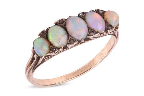 Lot 18 - An opal-set half hoop ring; set with five...