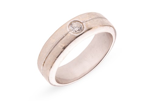Lot 140 - A diamond-set dress ring, flush-set with a...