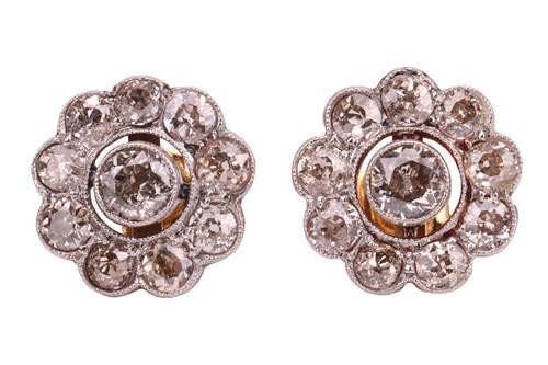 Lot 22 - A pair of diamond-set floral earrings, with a...