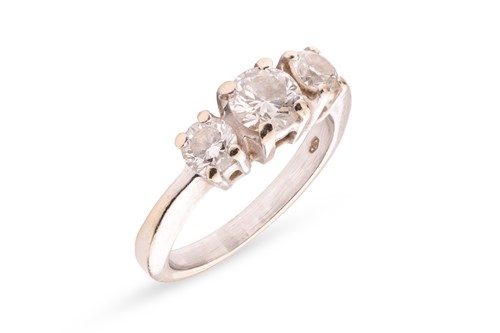 Lot 153 - A diamond trilogy ring, with an estimated...