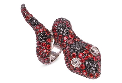 Lot 172 - A diamond and gem-set serpent ring by Delfina...