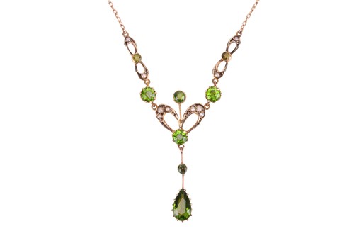 Lot 3 - A gem-set lavalier necklace, set with seed...