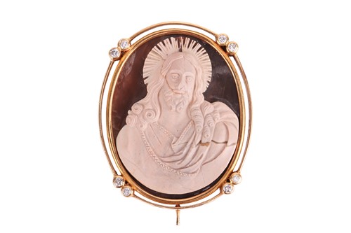 Lot 25 - A hardstone cameo reliquary, the ferruginous...