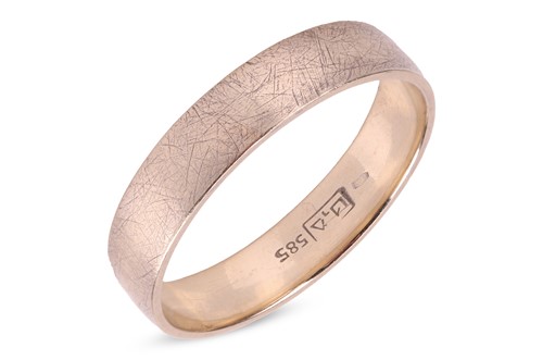 Lot 51 - A wedding band, with a plain polished band in...
