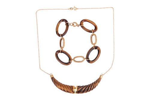 Lot 175 - A tiger's eye necklace and a bracelet; the...
