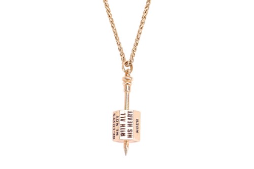 Lot 124 - A spinner pendant on chain, featuring a...