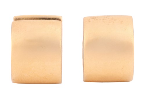 Lot 55 - Carl Bucherer - A pair of hinged hoop earrings,...