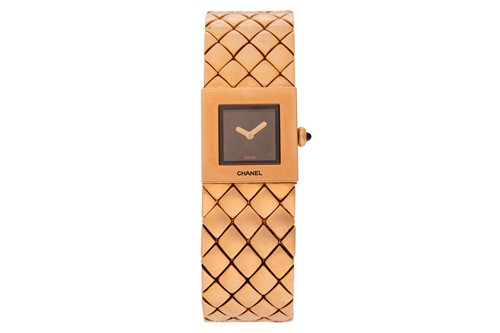 Lot 190 - Chanel - A Lady’s 18ct Gold Matelassé Bracelet...