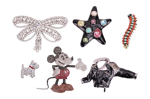 Lot 24 - A group of signed costume jewellery to include...