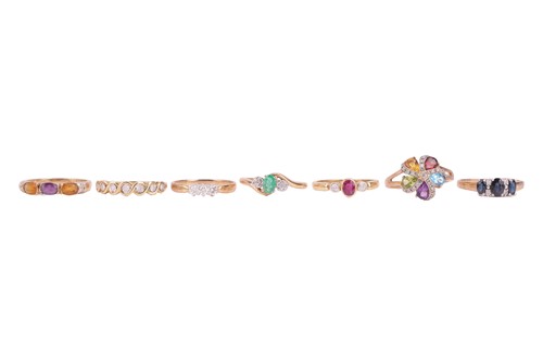 Lot 50 - A group of seven gem-set rings in 9ct gold; to...
