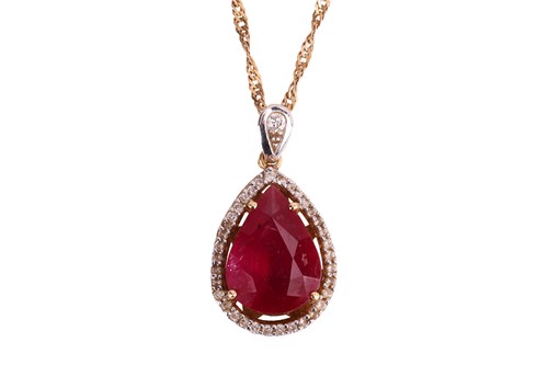 Lot 163 - A ruby and diamond-set pear-shaped pendant,...
