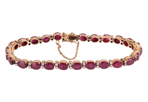 Lot 161 - A ruby and diamond line bracelet, comprising a...