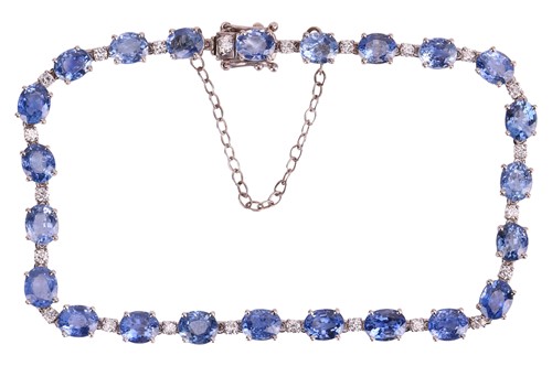 Lot 113 - A sapphire and diamond line bracelet,...