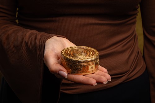 Lot 253 - A Louis XV vari-coloured snuff box, of oval...