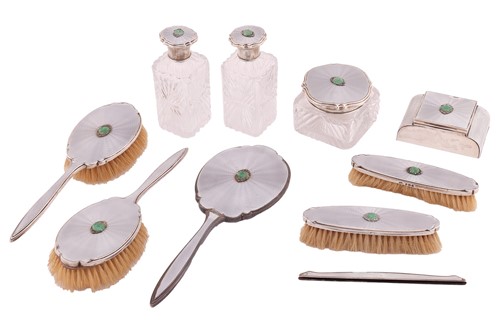 Lot 273 - Asprey - A nine piece, silver, guilloché and...