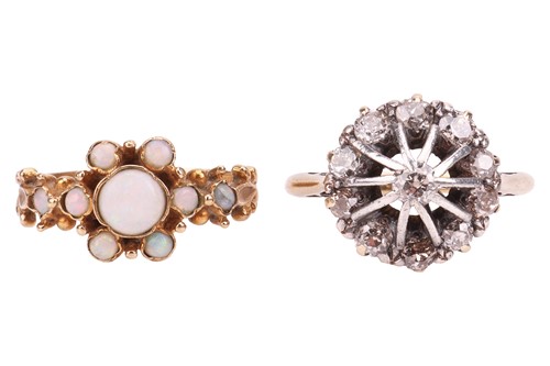 Lot 21 - Two rings; comprising an opal-set dress ring...