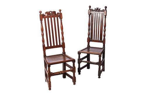 Lot 56 - A near pair of William III oak back-stools,...